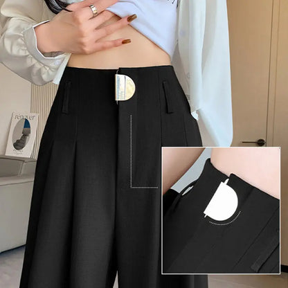 Dressingbroek – hoge taille en wijde pijpen voor een stijlvolle, vlotte look. Perfect voor een elegante en comfortabele outfit, ideaal voor zowel werk als vrije tijd.