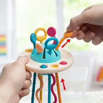 Montessori UFO siliconen duw- & trekkoord activiteitenspeeltje (6-18M+) – stimuleert de motorische vaardigheden en zintuiglijke ontwikkeling van je baby. Veilig, duurzaam en leuk!