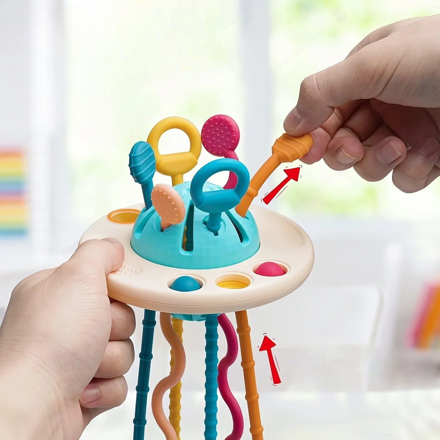 Montessori UFO siliconen duw- & trekkoord activiteitenspeeltje (6-18M+) – stimuleert de motorische vaardigheden en zintuiglijke ontwikkeling van je baby. Veilig, duurzaam en leuk!