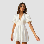 Nola – Elegante geborduurde bloemjurk voor vrouwen met verfijnde details en een romantisch silhouet, perfect voor lente- en zomerdagen.