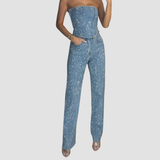 Virale diamanten jeans met hoge taille van stretch denim, versierd met glinsterende steentjes voor een opvallende, trendy look.