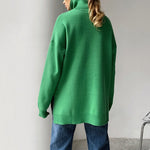 Aaliyah – Stijlvolle zijsplit trui voor dames – Trendy en comfortabele trui met split aan de zijkanten, perfect voor casual looks en moderne stijl. Ideaal voor het najaar en het combineren met jeans of een rok.
