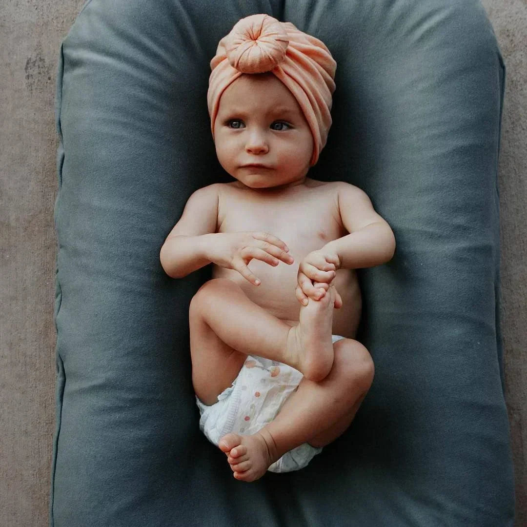 SnugiNest babynest – zacht en ademend nestje dat comfort en veiligheid biedt, ergonomisch design voor geborgen slaap van pasgeborenen.