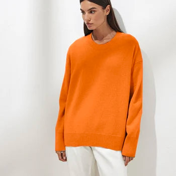Basic damestrui van kasjmier in een effen kleur, met een tijdloos ontwerp en comfortabele pasvorm – perfect voor een elegante en warme look.