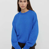 Basic damestrui van kasjmier in een effen kleur, met een tijdloos ontwerp en comfortabele pasvorm – perfect voor een elegante en warme look.