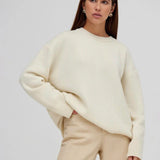 Basic damestrui van kasjmier in een effen kleur, met een tijdloos ontwerp en comfortabele pasvorm – perfect voor een elegante en warme look.