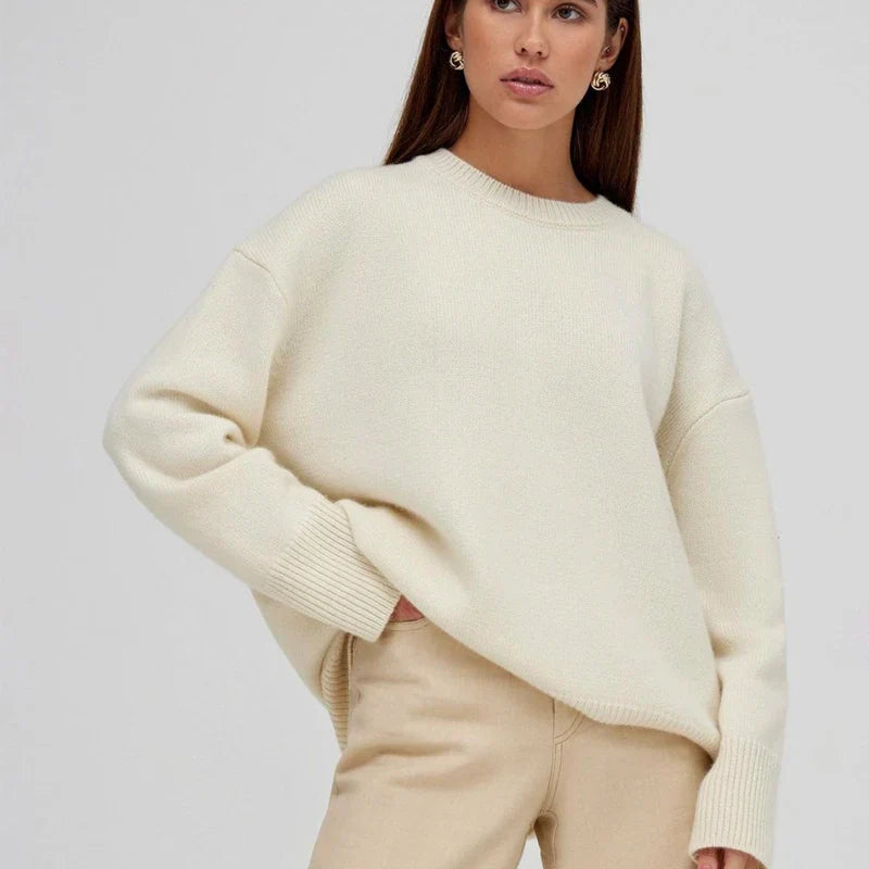 Basic damestrui van kasjmier in een effen kleur, met een tijdloos ontwerp en comfortabele pasvorm – perfect voor een elegante en warme look.