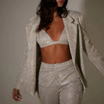 Kylie glitter party set voor dames met glinsterende stof, flatterende pasvorm en feestelijke look – perfect voor avondjes uit en speciale gelegenheden.