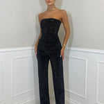 Virale diamanten jeans met hoge taille van stretch denim, versierd met glinsterende steentjes voor een opvallende, trendy look.