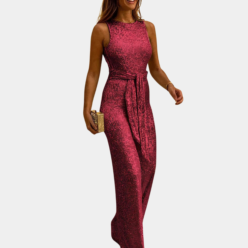 Clara glitter jumpsuit – stijlvolle dameslook met elegante pasvorm, sprankelend design en perfect voor feestelijke gelegenheden.