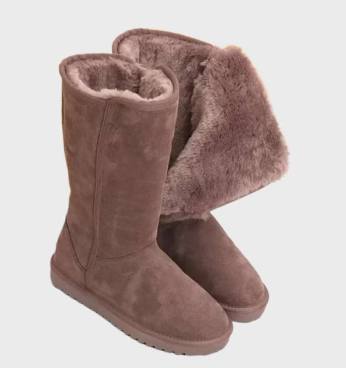 De Valeria Waterdichte Suède Sheepskin Laarzen met Ritssluiting bieden luxe warmte en stijlvol comfort, ideaal voor elegante en beschermde winterlooks.