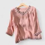 Dames blouse met ronde hals en uitlopende mouwen