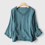 Dames blouse met ronde hals en uitlopende mouwen