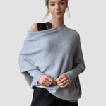 Elegante off-shoulder damestrui in een zachte stof, met lange mouwen en een flatterende pasvorm – ideaal voor een stijlvolle en vrouwelijke look.