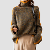 Warme trui met grote col voor dames, gemaakt van dik gebreid materiaal en ontworpen voor comfort en stijl tijdens koude dagen.