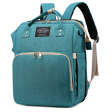 MamaBag alles-in-één luiertas met babybedje en USB-poort – ruim, multifunctioneel ontwerp en comfortabele draagstijl voor moeders onderweg.