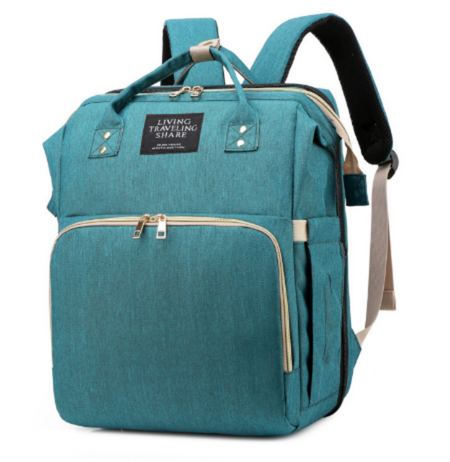 MamaBag alles-in-één luiertas met babybedje en USB-poort – ruim, multifunctioneel ontwerp en comfortabele draagstijl voor moeders onderweg.