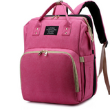 MamaBag alles-in-één luiertas met babybedje en USB-poort – ruim, multifunctioneel ontwerp en comfortabele draagstijl voor moeders onderweg.