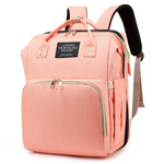 MamaBag alles-in-één luiertas met babybedje en USB-poort – ruim, multifunctioneel ontwerp en comfortabele draagstijl voor moeders onderweg.