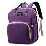 MamaBag alles-in-één luiertas met babybedje en USB-poort – ruim, multifunctioneel ontwerp en comfortabele draagstijl voor moeders onderweg.