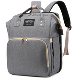 MamaBag alles-in-één luiertas met babybedje en USB-poort – ruim, multifunctioneel ontwerp en comfortabele draagstijl voor moeders onderweg.