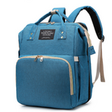 MamaBag alles-in-één luiertas met babybedje en USB-poort – ruim, multifunctioneel ontwerp en comfortabele draagstijl voor moeders onderweg.