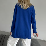 Aaliyah – Stijlvolle zijsplit trui voor dames – Trendy en comfortabele trui met split aan de zijkanten, perfect voor casual looks en moderne stijl. Ideaal voor het najaar en het combineren met jeans of een rok.