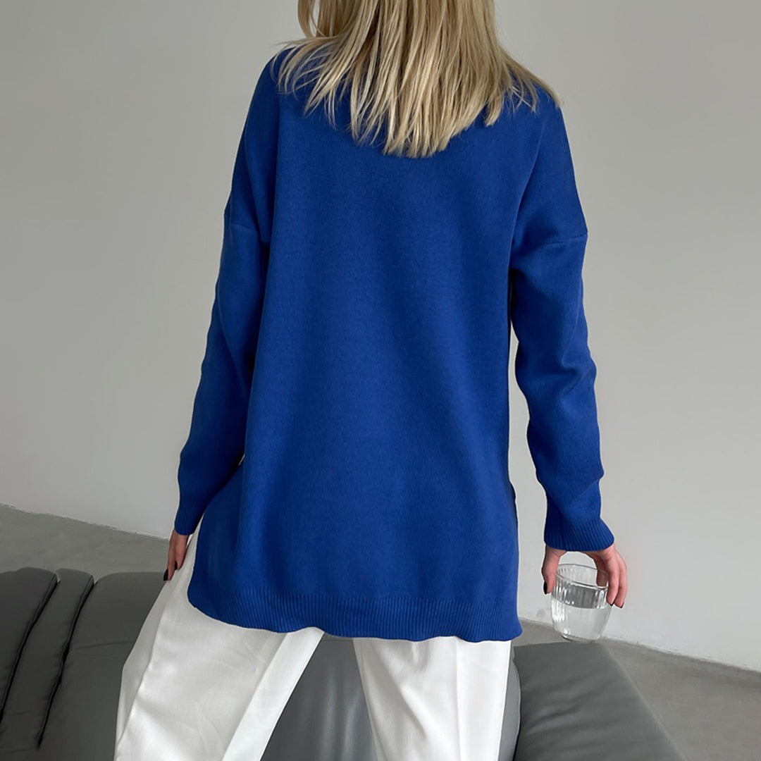 Aaliyah – Stijlvolle zijsplit trui voor dames – Trendy en comfortabele trui met split aan de zijkanten, perfect voor casual looks en moderne stijl. Ideaal voor het najaar en het combineren met jeans of een rok.