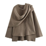 Elora oversized knitted coat voor dames – comfortabele en stijlvolle gebreide jas van zachte, hoogwaardige stof, perfect voor casual en chique winterlooks.