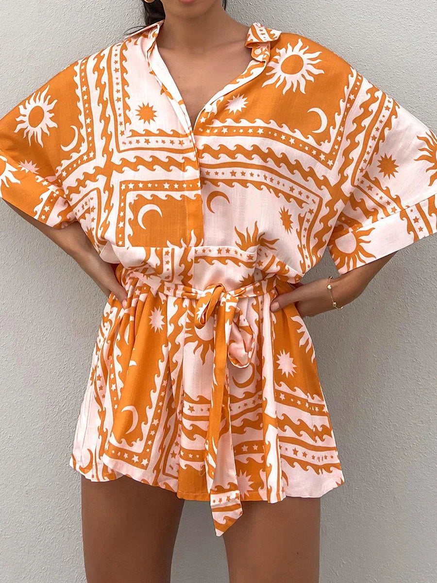 Korte mouw geborduurde blouse set met ceintuur van lichte, ademende stof met elegante pasvorm en verfijnde details.