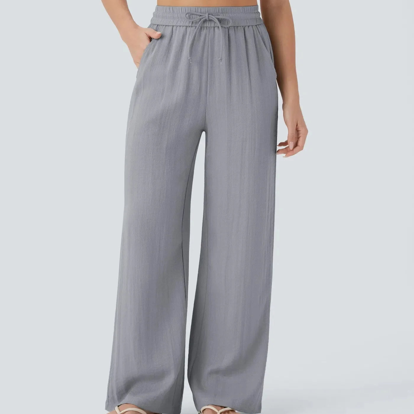 Casual linnen broek voor dames – hoge taille en wijde pijpen voor een luchtige, stijlvolle en comfortabele zomerse look.