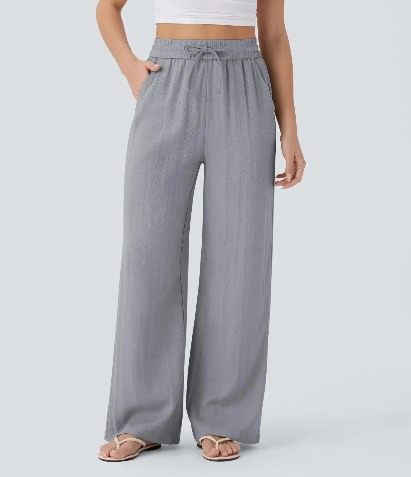 Casual linnen broek voor dames – hoge taille en wijde pijpen voor een luchtige, stijlvolle en comfortabele zomerse look.