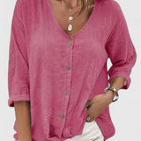 Dames blouse met knoopsluiting en driekwart mouwen