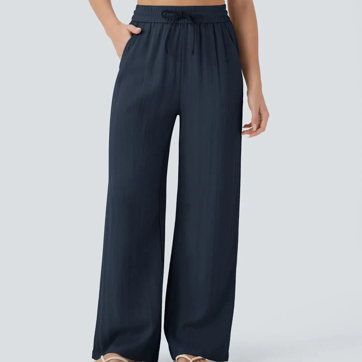 Casual linnen broek voor dames – hoge taille en wijde pijpen voor een luchtige, stijlvolle en comfortabele zomerse look.