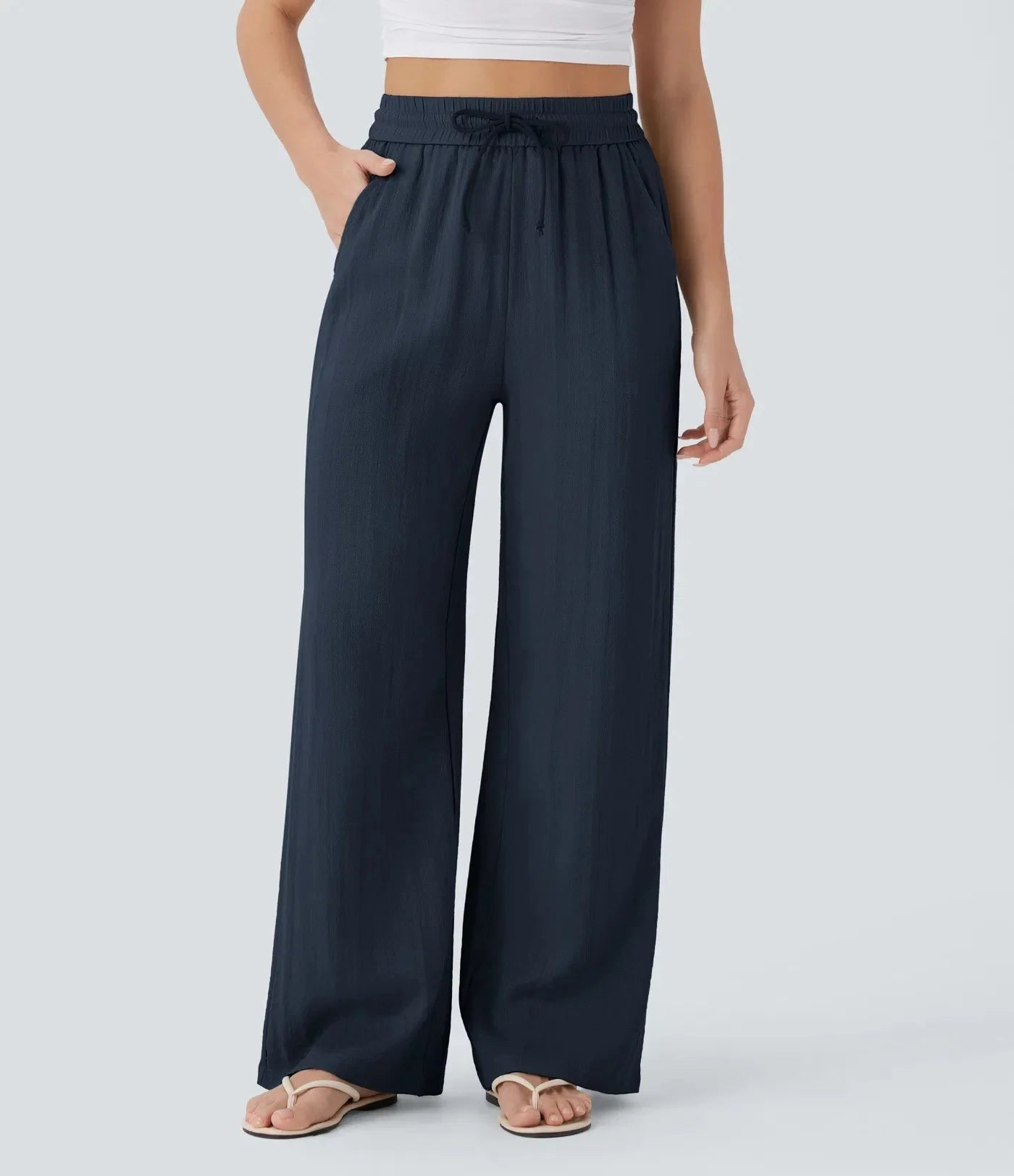 Casual linnen broek voor dames – hoge taille en wijde pijpen voor een luchtige, stijlvolle en comfortabele zomerse look.