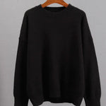 Basic damestrui van kasjmier in een effen kleur, met een tijdloos ontwerp en comfortabele pasvorm – perfect voor een elegante en warme look.