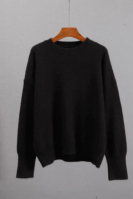 Basic damestrui van kasjmier in een effen kleur, met een tijdloos ontwerp en comfortabele pasvorm – perfect voor een elegante en warme look.