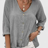 Dames blouse met knoopsluiting en driekwart mouwen