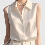 Dames blouse mouwloos met kraag en knoopsluiting