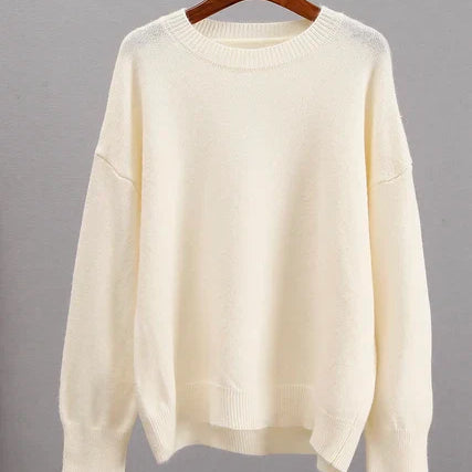Basic damestrui van kasjmier in een effen kleur, met een tijdloos ontwerp en comfortabele pasvorm – perfect voor een elegante en warme look.