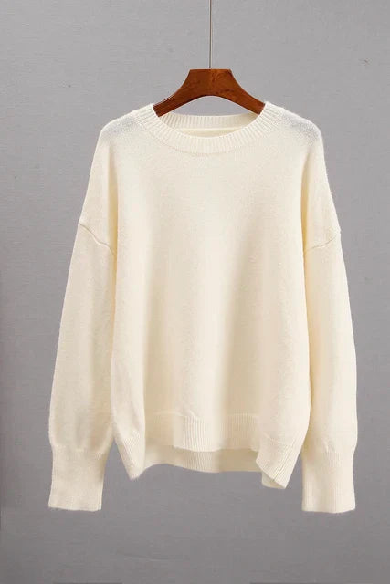 Basic damestrui van kasjmier in een effen kleur, met een tijdloos ontwerp en comfortabele pasvorm – perfect voor een elegante en warme look.
