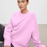 Basic damestrui van kasjmier in een effen kleur, met een tijdloos ontwerp en comfortabele pasvorm – perfect voor een elegante en warme look.