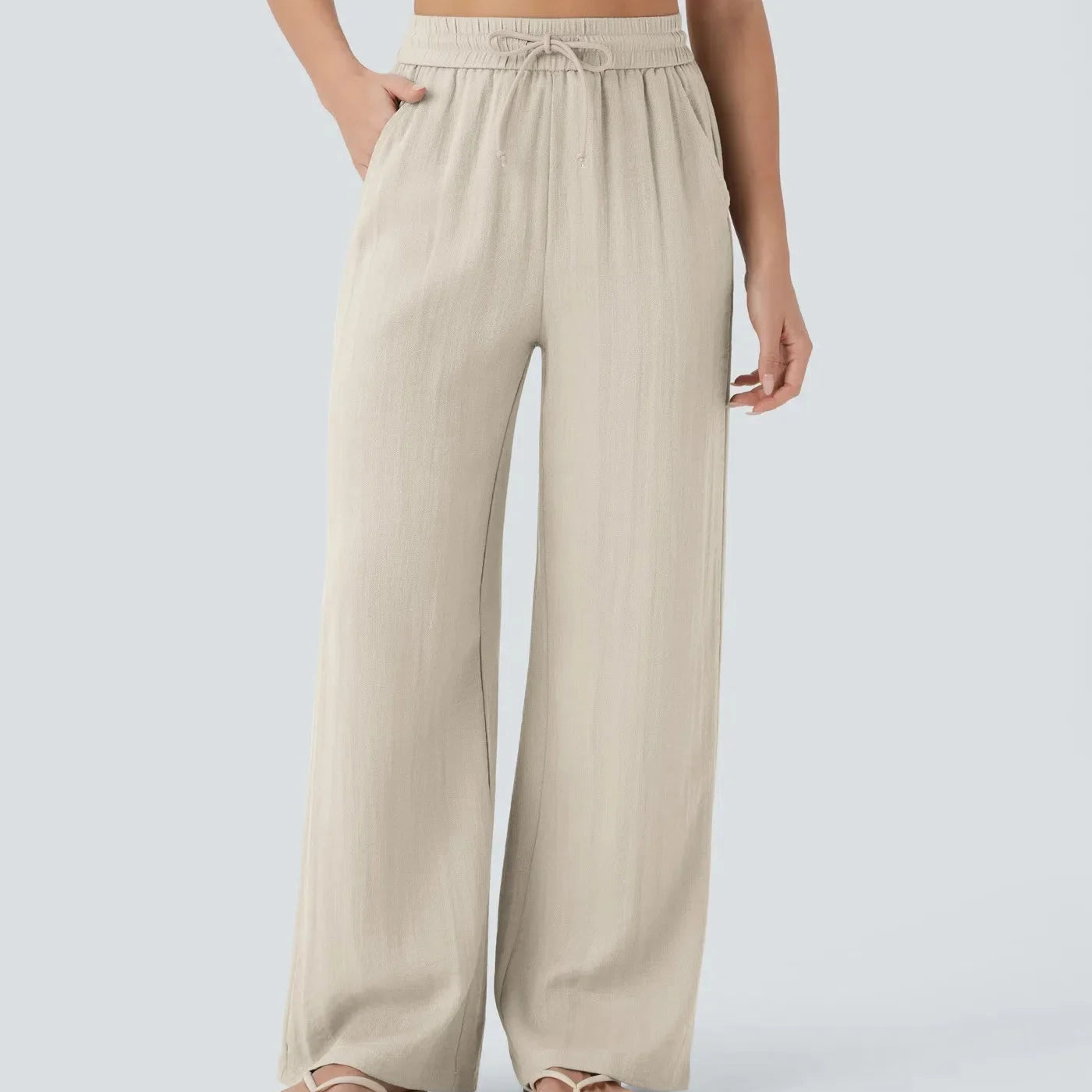 Casual linnen broek voor dames – hoge taille en wijde pijpen voor een luchtige, stijlvolle en comfortabele zomerse look.