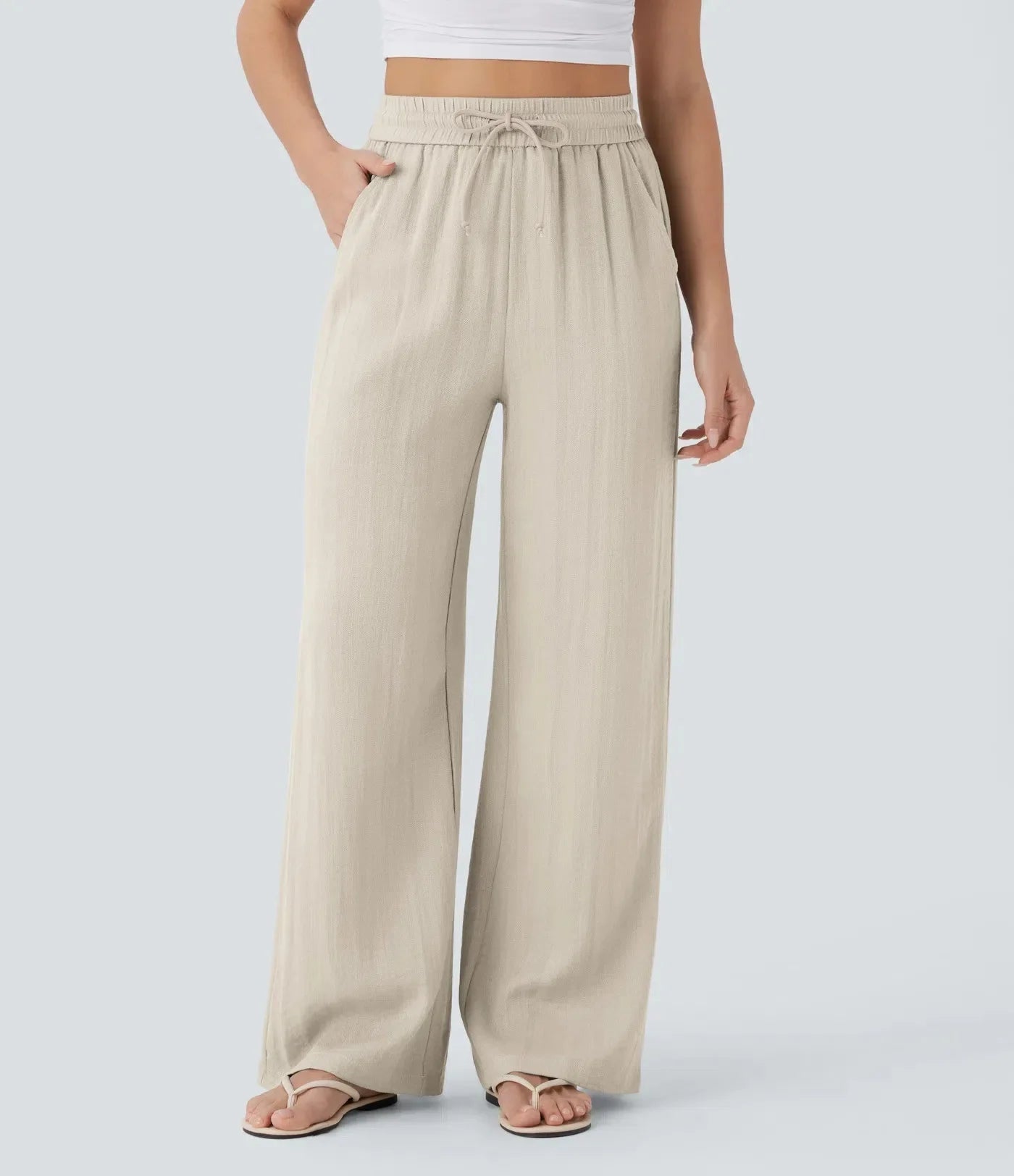 Casual linnen broek voor dames – hoge taille en wijde pijpen voor een luchtige, stijlvolle en comfortabele zomerse look.
