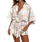 Korte mouw geborduurde blouse set met ceintuur van lichte, ademende stof met elegante pasvorm en verfijnde details.