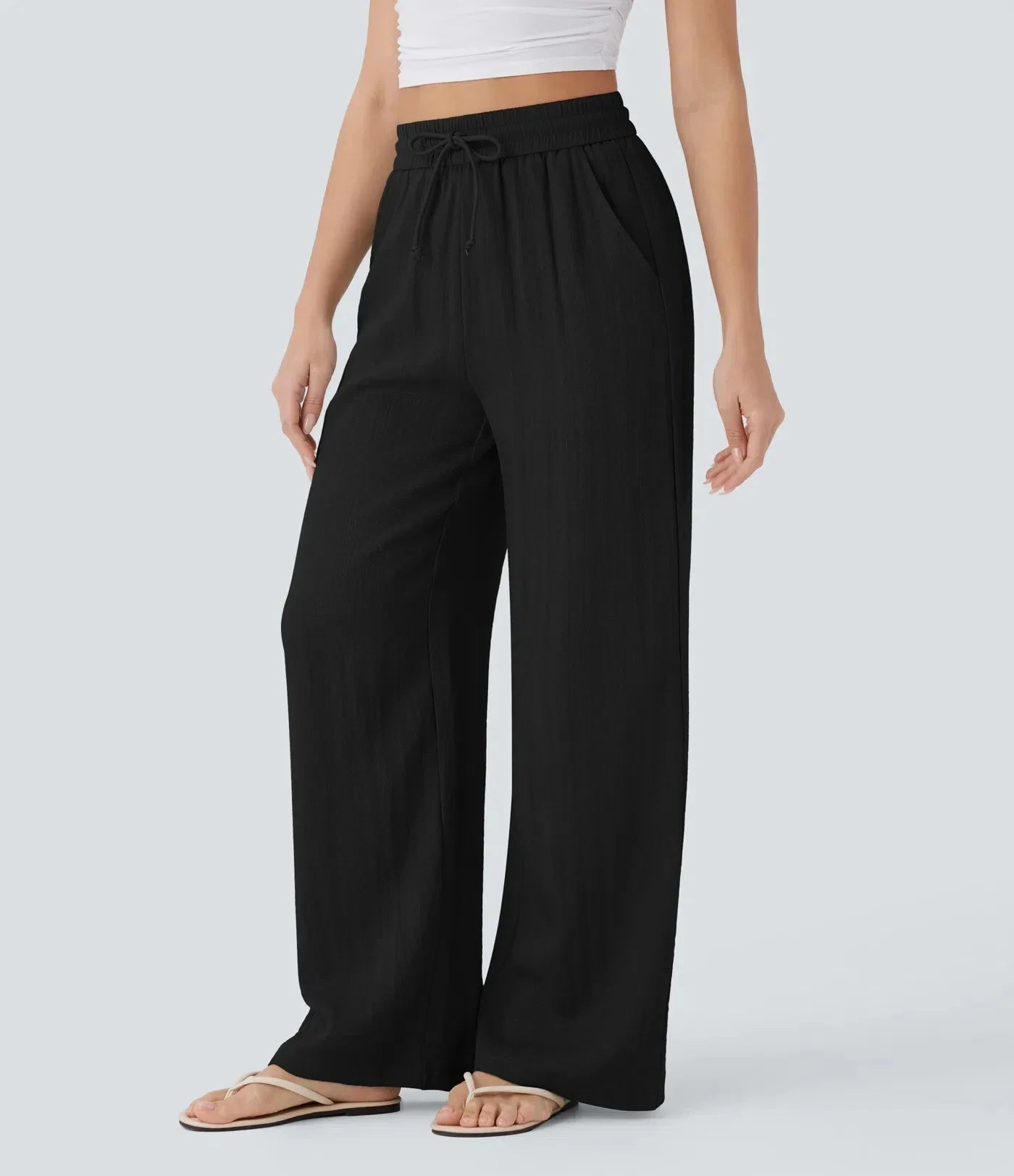 Casual linnen broek voor dames – hoge taille en wijde pijpen voor een luchtige, stijlvolle en comfortabele zomerse look.