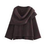 Elora oversized knitted coat voor dames – comfortabele en stijlvolle gebreide jas van zachte, hoogwaardige stof, perfect voor casual en chique winterlooks.