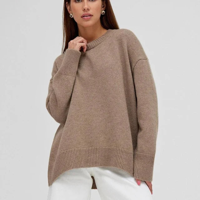 Basic damestrui van kasjmier in een effen kleur, met een tijdloos ontwerp en comfortabele pasvorm – perfect voor een elegante en warme look.