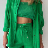 Zomerse dames 2-delige set – lange blouse en hoge taille shorts, een frisse en luchtige outfit voor warmere dagen. Ideaal voor casual zomerlooks of ontspannen buitenactiviteiten.