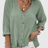 Dames blouse met knoopsluiting en driekwart mouwen